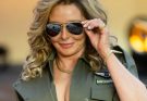 Carol Vorderman flaunts her toned abs and buxom bottom