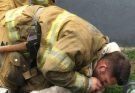 A brave group of firefighters saved a lifeless dog from a devastating fire, performing mouth-to-snout resuscitation to bring the animal back to life after it was pulled from the flames.